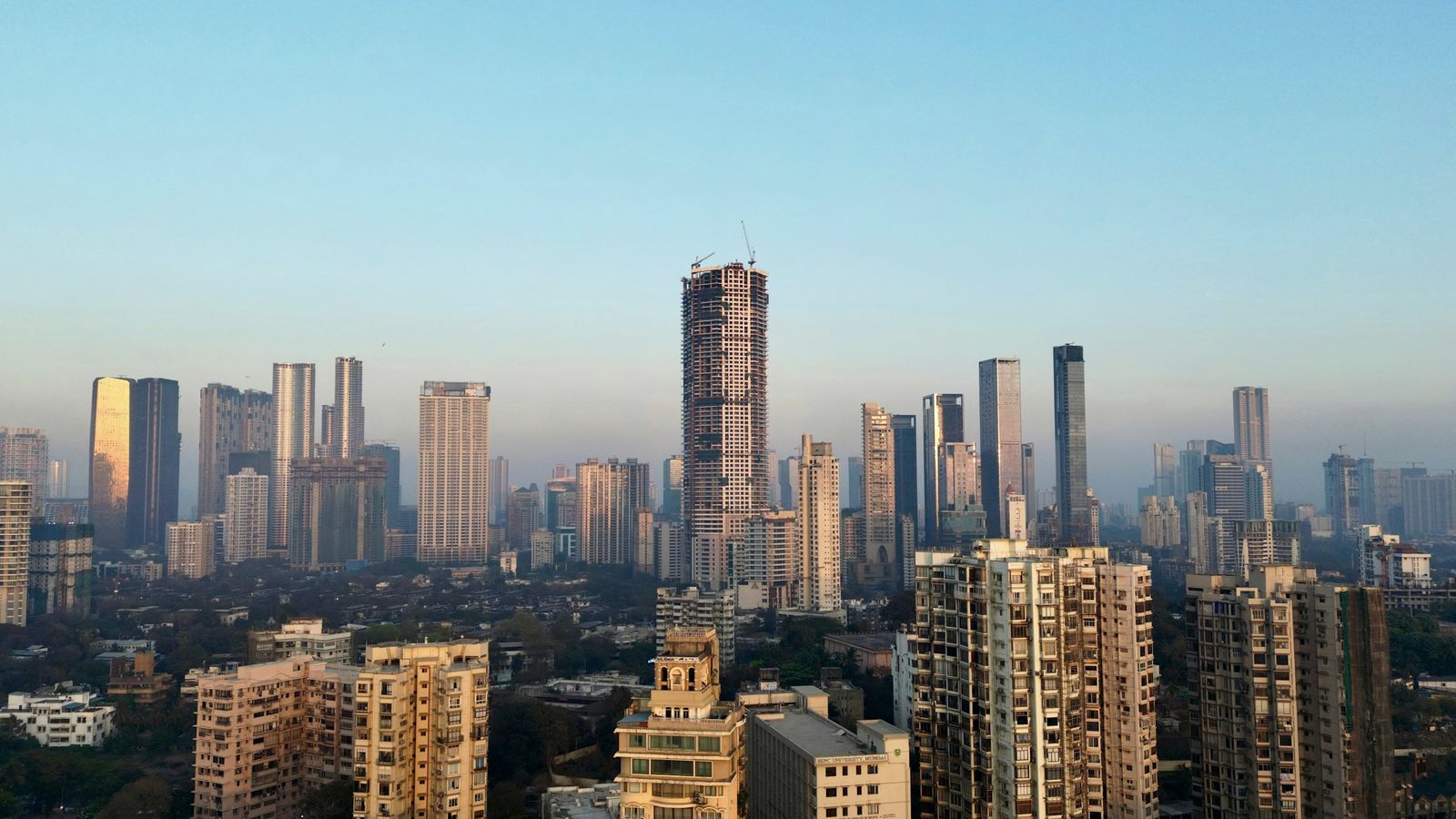 Modern skyline of South Mumbai under a clear blue sky